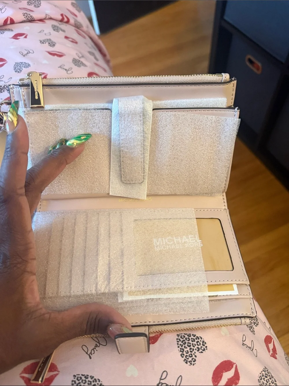 Michael Kors Pale Blush Pebbled Leather Wristlet with Gold Logo